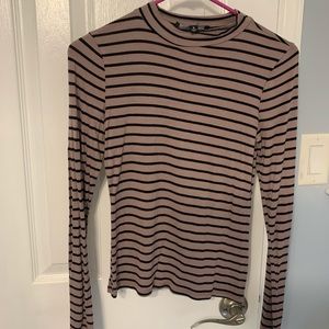Lulu’s long sleeve shirt. Purple/pink color with black stripes. Tight fitting.